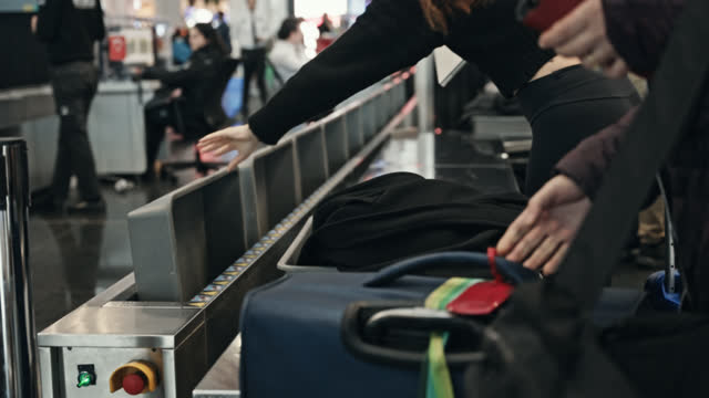 SLO MO Luggage Being Security Scanned At Airport