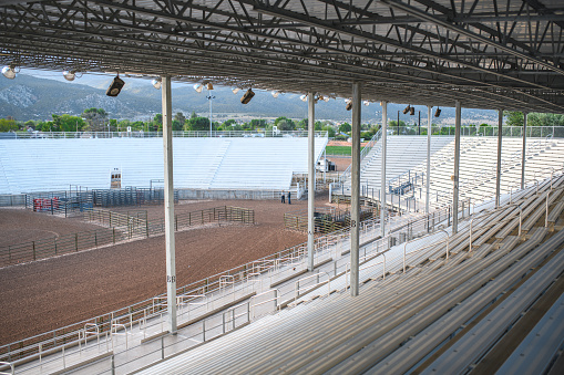 Empty stands at a rodeo arena.