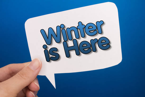 istock Speech bubble in front of colored background with Winter is Here text. 1460945033