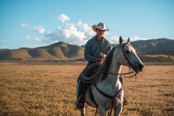 istock Young Cowboy with a Roping Lasso 1460945305