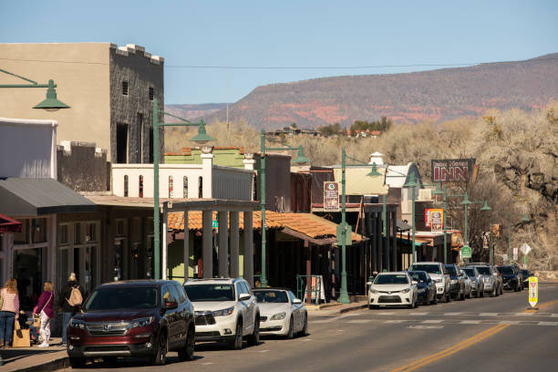 Cottonwood, Arizona, USA - January 9, 2022: Afternoon traffic flows through Main Street in the historic downtown quarter.