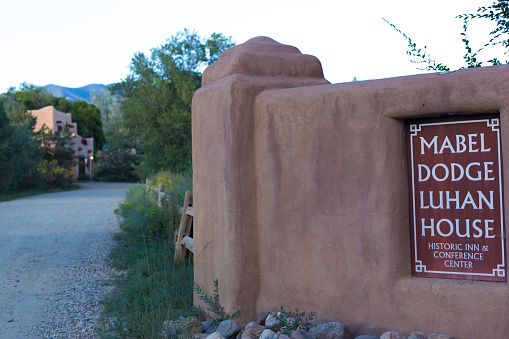 Taos, NM: The entry gate to the historic Mabel Dodge Luhan House, now a bed and breakfast. She was a writer and art patron who lived in Taos from 1917 to her death in 1962.