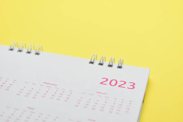 istock white calendar 2023 on yellow background 1460950974