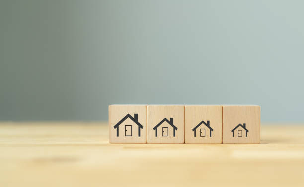istock Downsizing home, houses concept. Downsizing property due to retirement or budget. Finding a tiny house or apartment. Moving to a smaller property for retirement time.  Increasing cash flow. 1460959065