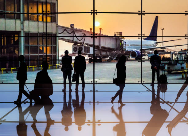 istock Busy airport terminal at sunset 1460962791