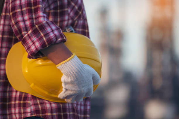 istock Woman construction engineer wear safety white hard hat at construction site industry worker. Female engineer worker civil engineering with hard hat safety helmet. Woman construction Engineer concept 1460964431