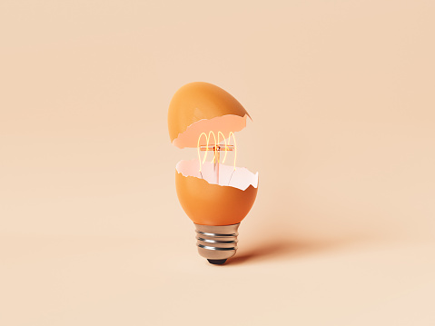 Creative 3D rendering of light bulb in shape of egg with broken shell placed against beige background