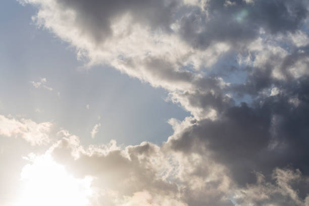 istock Panoramic view of blue sky with clouds and reflection of the sun 1460970466