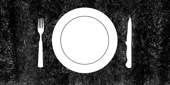 Topview of Set of Plate, Fork and Knife Silhouette on Dark Background