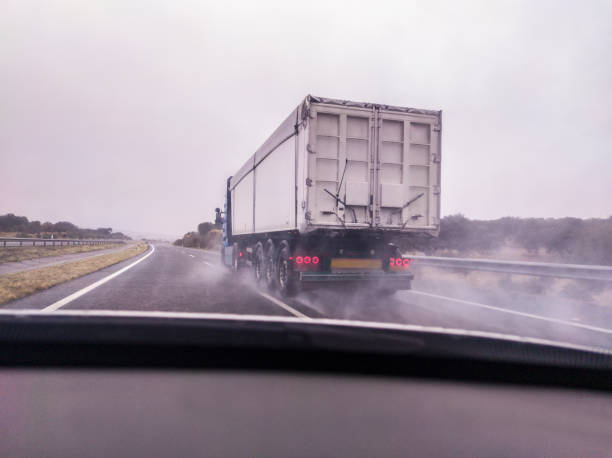 istock Driving behind large truck with heavy rain 1460978922