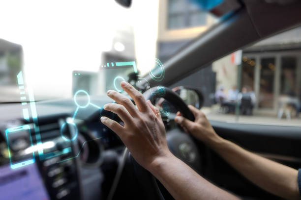 istock futuristic vehicle and graphical user interface(GUI). intelligent car. connected car. Internet of Things. Heads up display(HUD). 1460979993