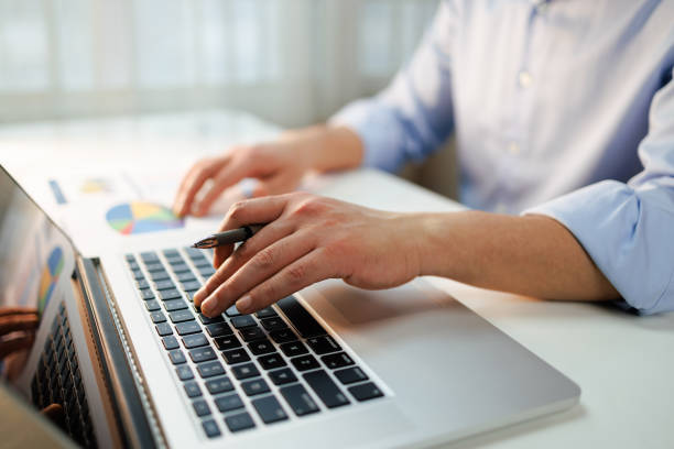 istock The male financial consultant is calculating the chart data 1460980395