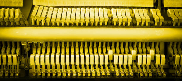 Details of piano mechanism gavel - string, pins and hammers