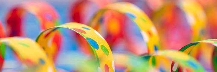 Colourful confetti streamer at carnival party