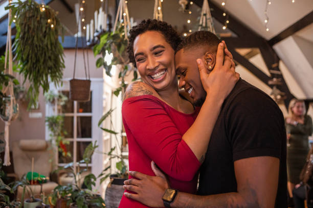 istock Black couple in love relaxing at a dinner party celebration 1460997671
