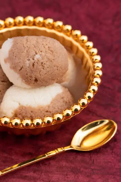 Photo of Indian Mithai Chocolate Rasgulla Also Called Choco Gulla, Rasagola, Rosgola, Roshogolla, Rossogolla, Rasbhari Or Rasbari Is Ball Shaped Dumpling Made Of Chhena, Sugar Syrup, Chena, Panir ,Paneer