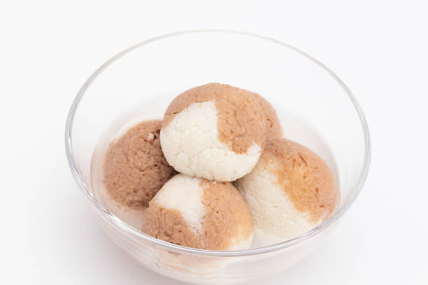 istock Indian Mithai Chocolate Rasgulla Also Called Choco Gulla, Rasagola, Rosgola, Roshogolla, Rossogolla, Rasbhari Or Rasbari Is Ball Shaped Dumpling Made Of Chhena, Sugar Syrup, Chena, Panir ,Paneer 1460999322