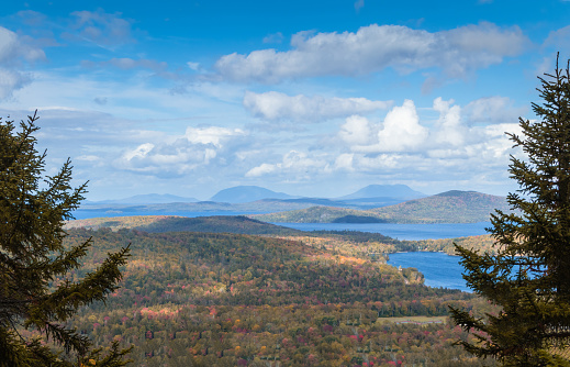 The view of Moosehead lake with early fall foliage. Maine, United States.