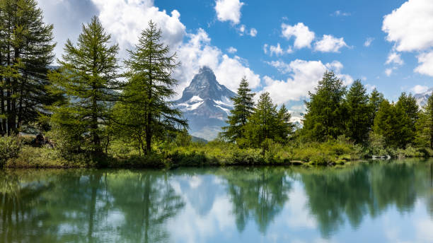 istock Famous Matterhorn mountain with the reflection on a lake 1461002009