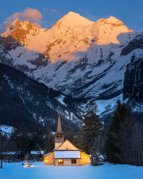 A church in a mountainous region on the sunrise