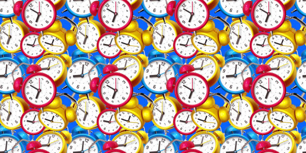istock 3d pattern of bright color retro alarm clock with arrow on color background 1461002283