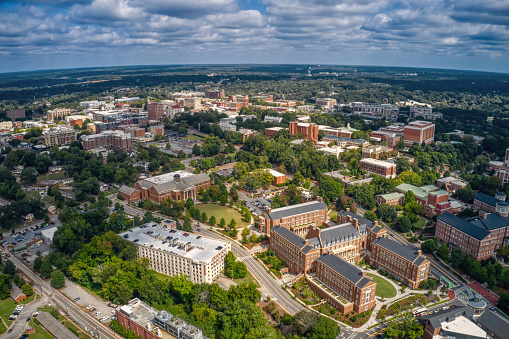 An aerial view of a Large Public University surrounded by dense buildings in Athens, Georgia