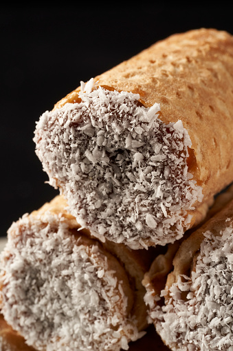 A close-up shot of urbanites with dulce de leche and grated coconut.
