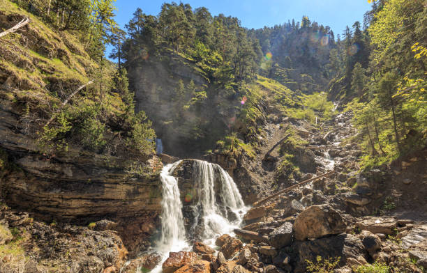 istock Beautiful shot of a waterfall in a mountain 1461004088