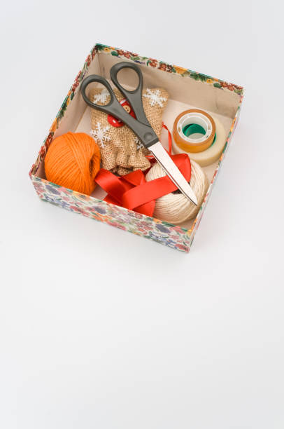 istock paperboard box with floral decorations and stationery on a white background 1461004404