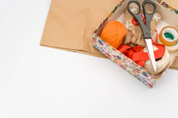 istock paperboard box with floral decorations and stationery on a white background 1461004406