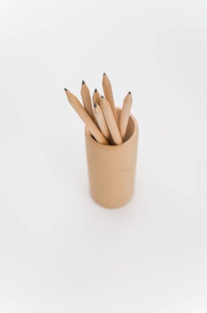 istock wooden pen holder with pencils on a white background 1461004551