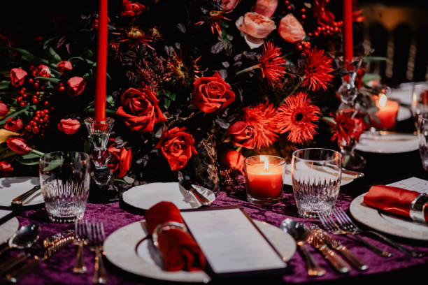 istock Selective of dining tables decorated with candles in the dark restaurant 1461004826