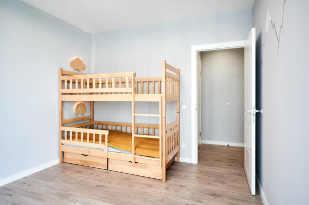 istock Modern child bedroom with wooden bunk bed. 1461005828