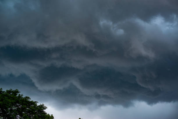 istock Low angle shot of a dark cloudy sky 1461007074