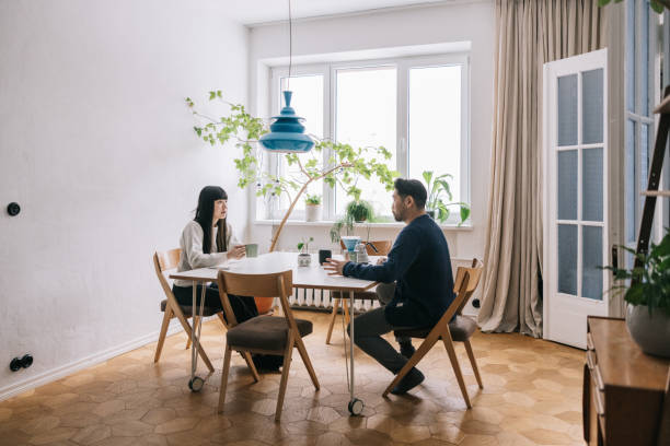 istock Couple in prepares coffee in their beautiful, modern apartment. 1461007685