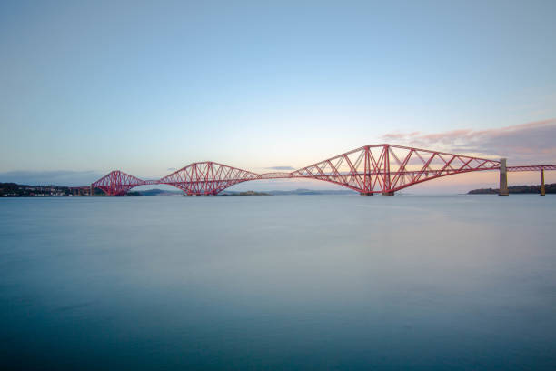 istock Beautiful view of the Forth Bridge (railway) on the river with cloudy sky in South UK 1461008496