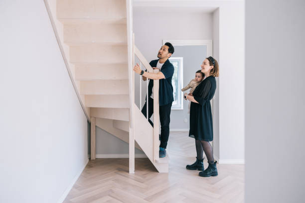 istock Young family looking at potential new home 1461009910