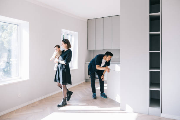 istock Young family looking at potential new home 1461009970