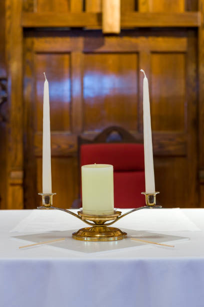istock Closeup shot of a unity candle on a table 1461010931