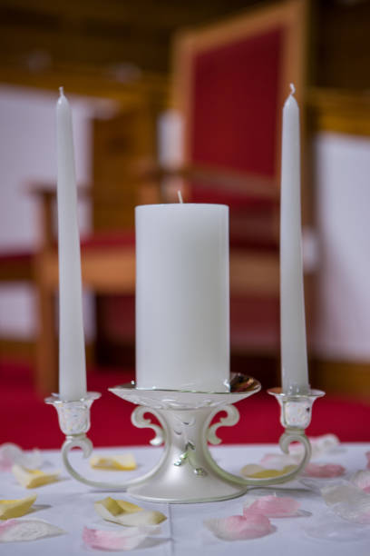 istock Closeup shot of a unity candle on a table 1461010949