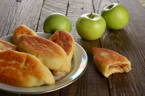istock Patty with fresh green apples on a wooden table 1461011611