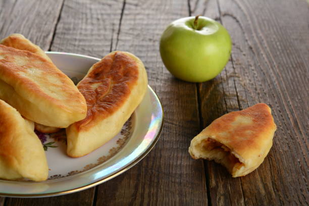 istock Patty with fresh green apples on a wooden table 1461011616