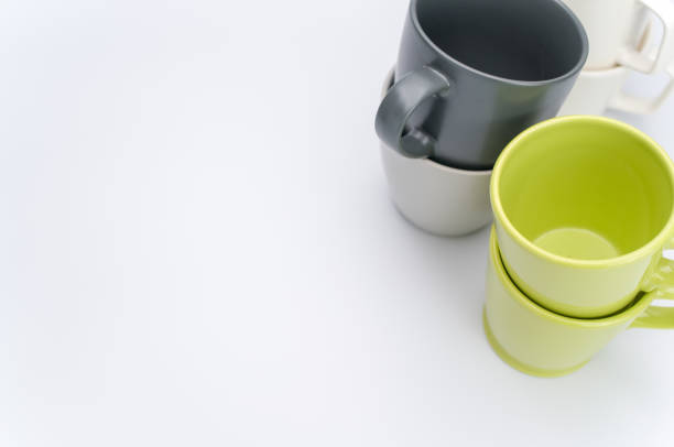 istock set of piled up mugs on a white background with space for text 1461012176