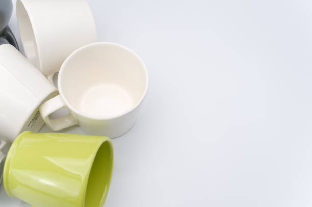 istock set of piled up mugs on a white background with space for text 1461012184