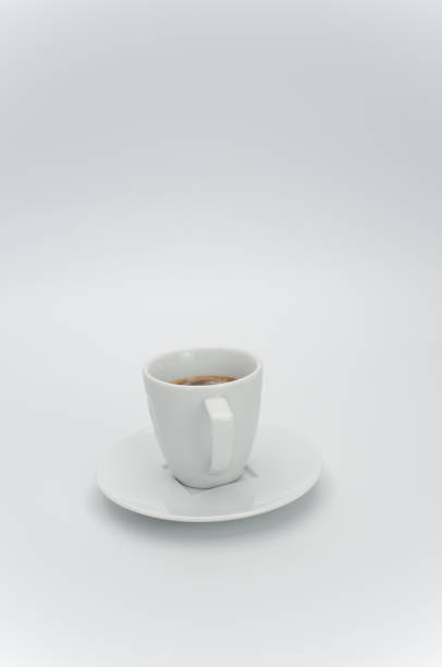 istock white stoneware strong espresso coffee cup and plate on a white tabletop 1461013119