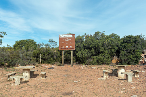 Rooiberg Pass, South Africa - Sep 24, 2022: Top of the Rooiberg Pass in the Western Cape Province. An information board and picnic tables are visible