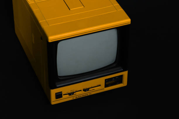 istock Old retro analog television on a black background 1461015091