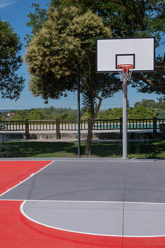 A vertical shot of a basketball court in the apar