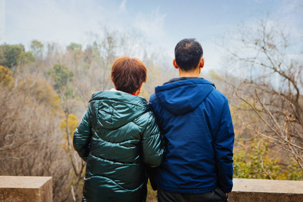 Middle-aged couples walking outdoors