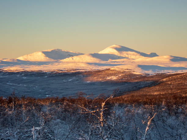 istock Beautiful shot of snowy mountains 1461017982